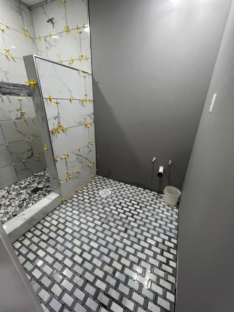 Shower with hexagon tile floor